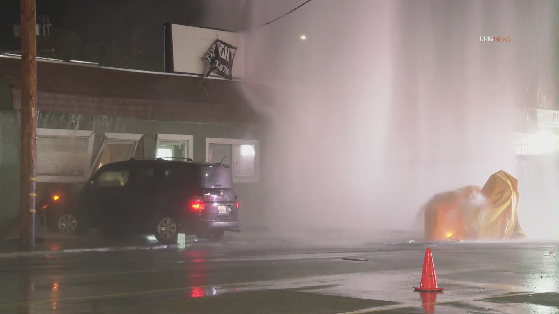 Out-of-control driver floods street after slamming into hydrant, building 